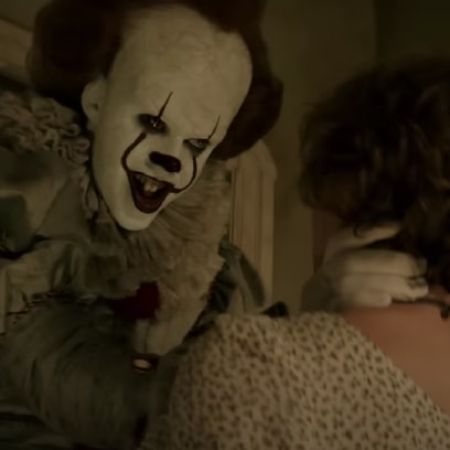 Pennywise is interacting with the little kid.
